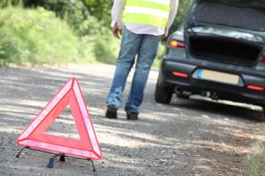 Hazard triangle at a breakdown clipart