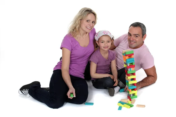 Rodzice gra z córką na podłodze — Zdjęcie stockowe