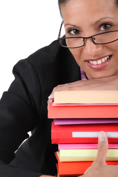 Employee holding a stack of files — Stock Photo, Image