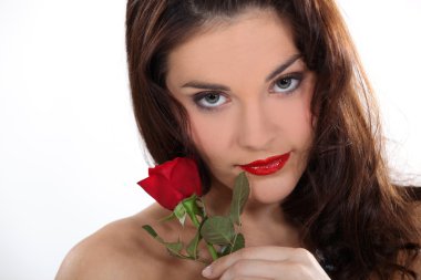 Sexy woman holding a rose clipart