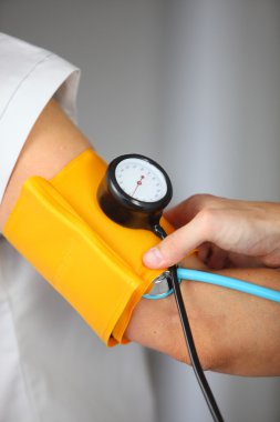 Blood pressure being taken clipart