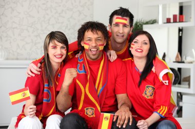 Four Spanish sports fans clipart