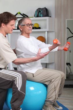 Senior women in rehabilitation class clipart