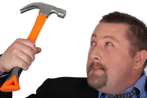 Businessman holding hammer — Stock Photo, Image