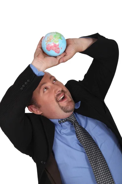 Man hijs lucht globe — Stockfoto