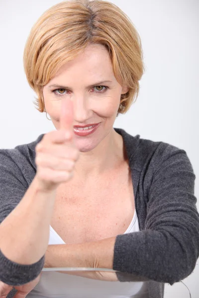 Woman pointing finger — Stock Photo, Image