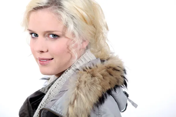 Portrait of blonde woman with coat — Stock Photo, Image