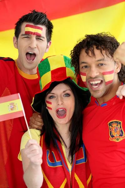 Drie Spaanse voetbalfans — Stockfoto