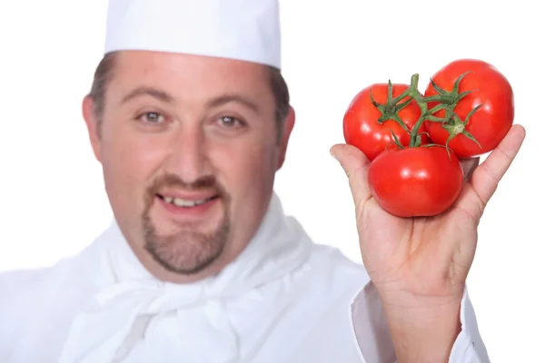 Cook with three tomatoes — Stock Photo, Image
