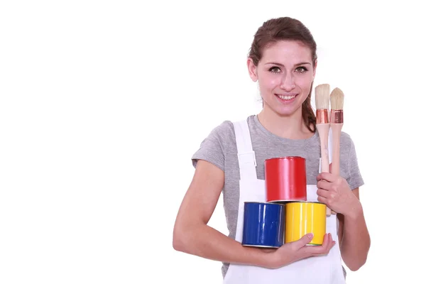 Menina com três latas de tinta — Fotografia de Stock