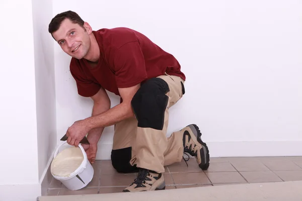 Pouring floor tiler product — Stock Photo, Image