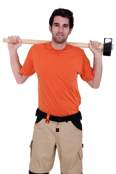 Craftsman holding a hammer — Stock Photo, Image