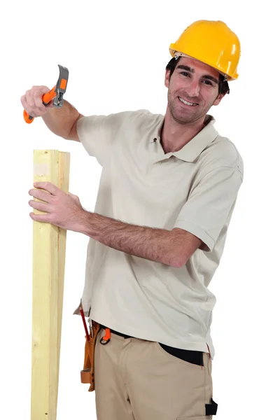 Carpenter with a hammer — Stock Photo, Image