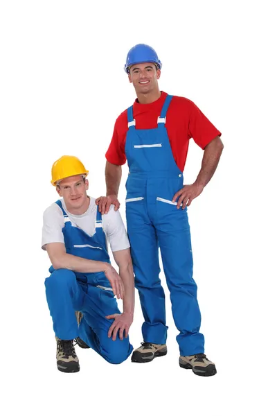 A team of tradesmen posing for the camera — Stock Photo, Image