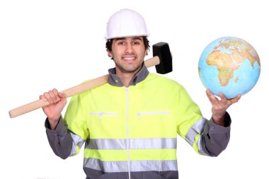 Tradesman holding a mallet and a globe clipart