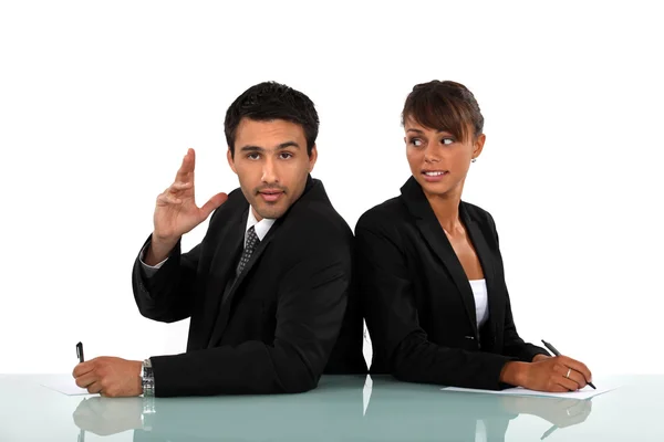 Business colleagues standing back to back — Stock Photo, Image