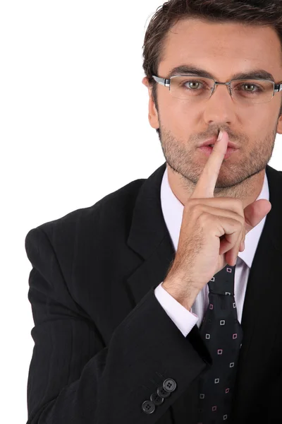 Businessman asking for quiet — Stock Photo, Image