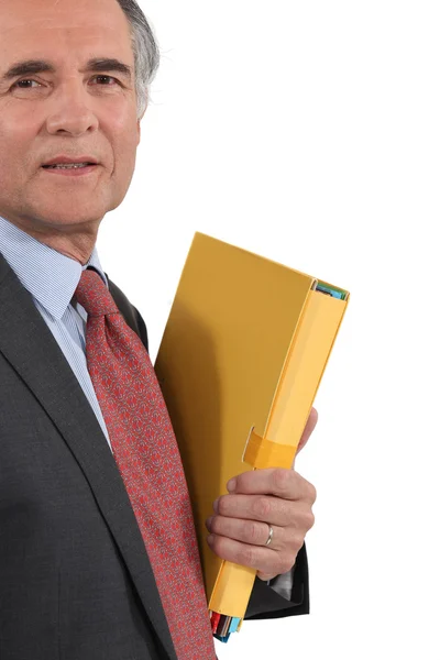 Senior businessman holding files isolated on white — Stock Photo, Image