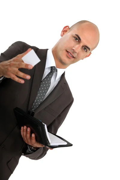 Businessman giving card — Stock Photo, Image