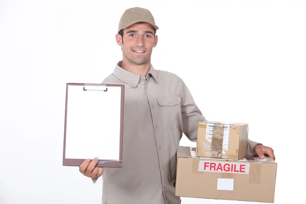 Delivery man requesting signature — Stock Photo, Image