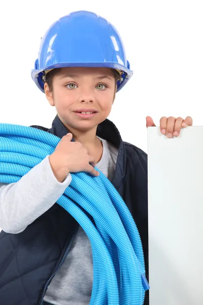 Malá holčička, oblečený jako elektrikář — Stock fotografie