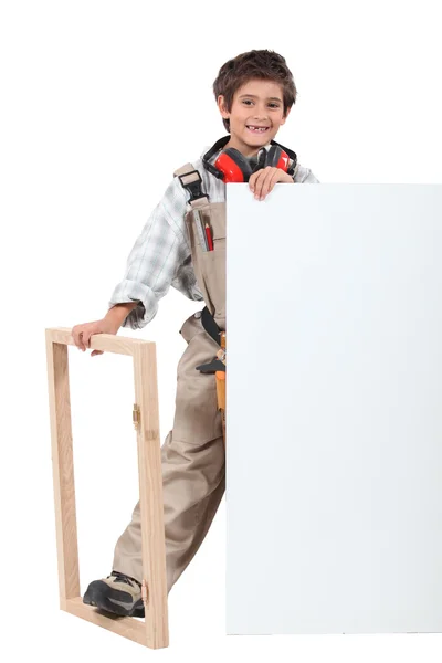 A little bit young for a handyman — Stock Photo, Image