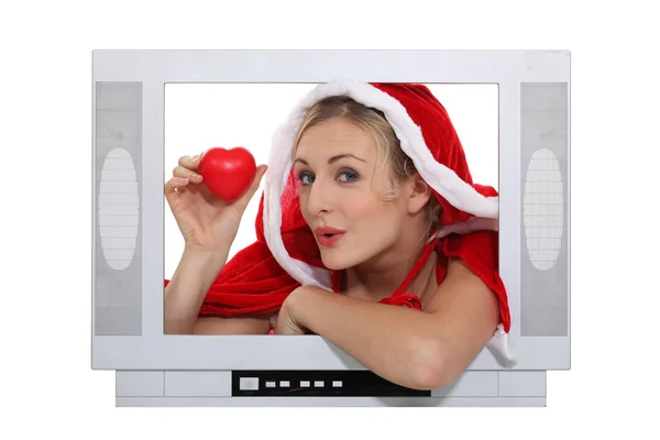 Alluring mother Christmas advertising for TV set — Stock Photo, Image