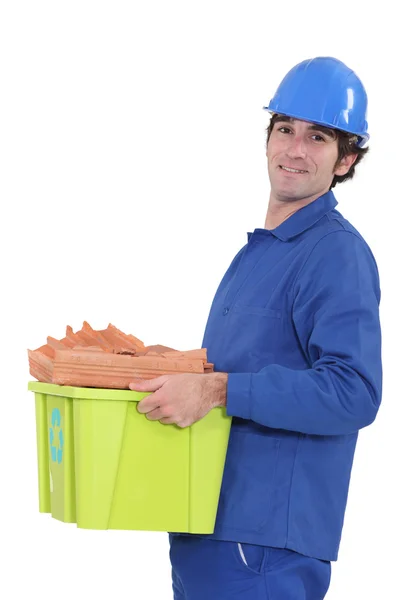 Tradesman taking out the recycling — Stock Photo, Image