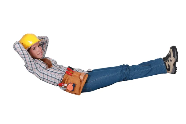 Tradeswoman floating in the air — Stock Photo, Image