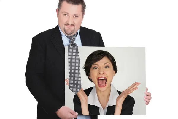Empresário com uma foto de uma mulher gritando — Fotografia de Stock