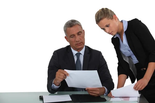 Businessman and assistant working together Stock Picture