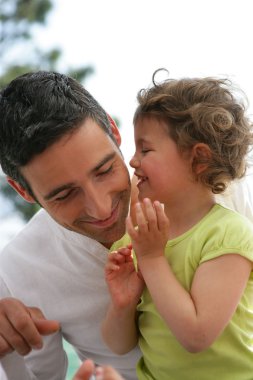 Father and daughter spending time together clipart