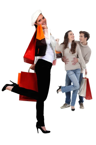 Tre con shopping bags — Foto Stock