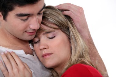 Man comforting his girlfriend clipart