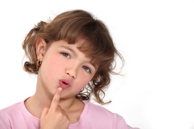 Pensive little girl. clipart