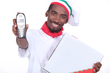 Smiling Italian chef with a phone and pizza box clipart