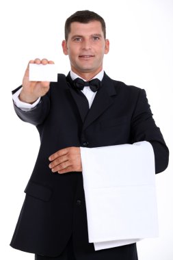 Waitor holding business card clipart