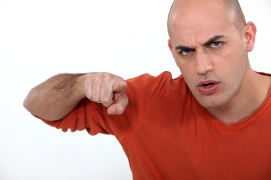 An angry man laying the blame clipart