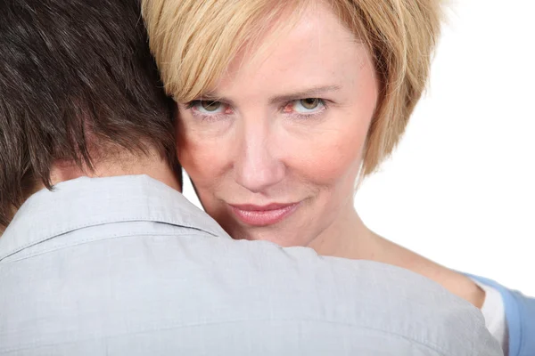 Woman looking over man — Stock Photo, Image