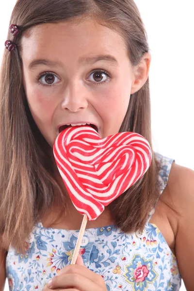 女孩吃棒棒糖 pop — 图库照片