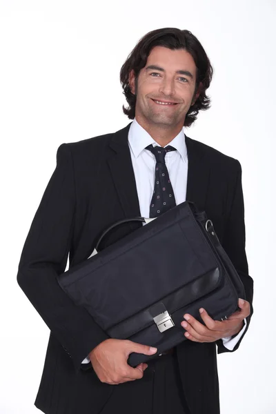 Uomo d'affari in possesso di una valigetta — Foto Stock