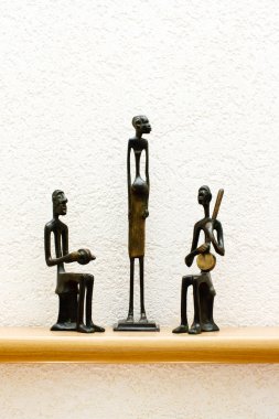 Three African figurines clipart