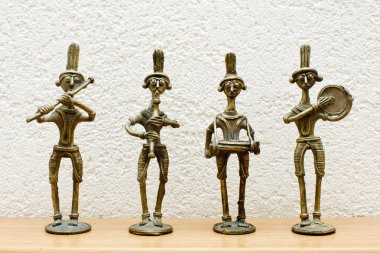 Four African statues clipart