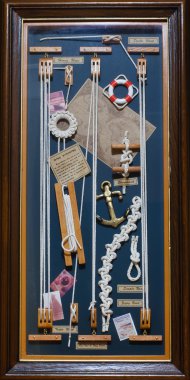 Collage of knots, ropes, life buoys and anchors clipart