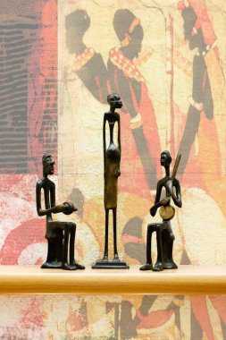 Three African figurines clipart