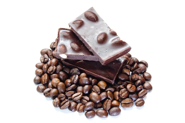 Pieces of chocolate with nuts and coffee beans — Stock Photo, Image