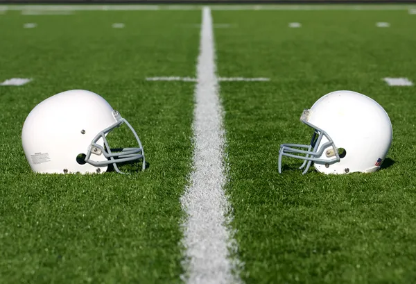 American Football Helmets on Field — Stock Photo, Image