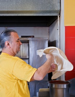 Pizza Making tossing crust clipart