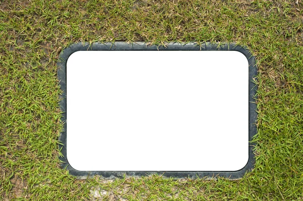 緑の芝生の上のボードの背景 — ストック写真