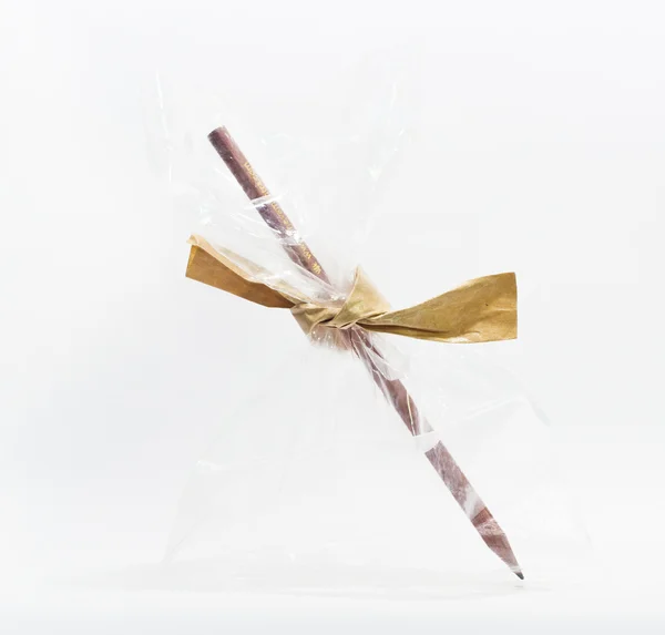 Pencil in plastic pack on white background — Stock Photo, Image